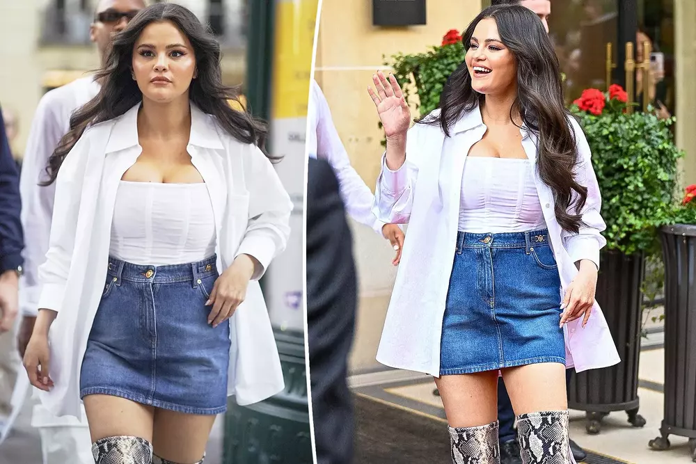 Selena Gomez puts on a stylish display in white corset top and skirt with snakeskin boots as she steps out in Paris